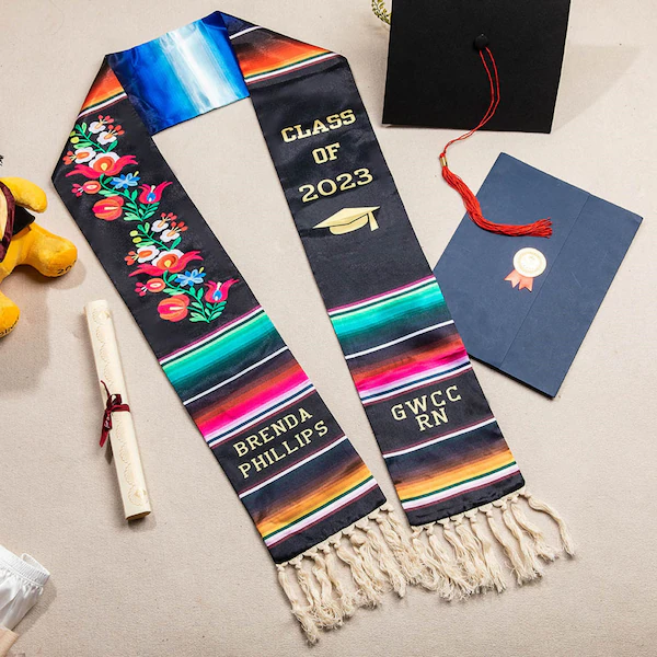 close-up of embroidered custom graduation sash design