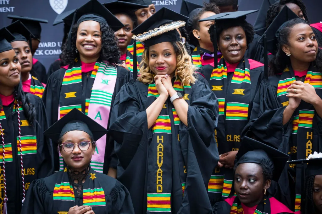Graduate wearing Kente Graduation Stole during ceremony